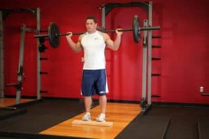 holding a barbell